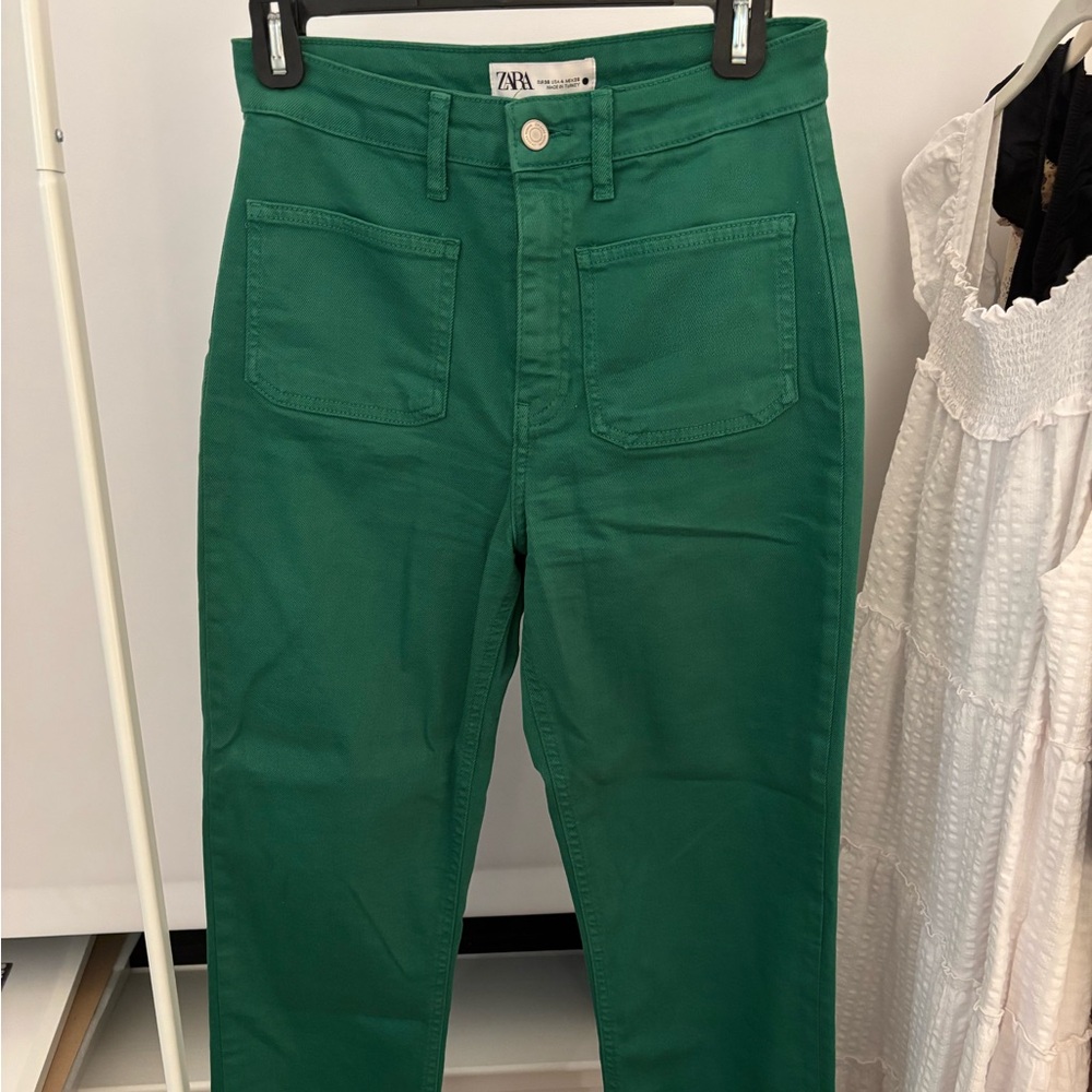 Green and pink jeans.